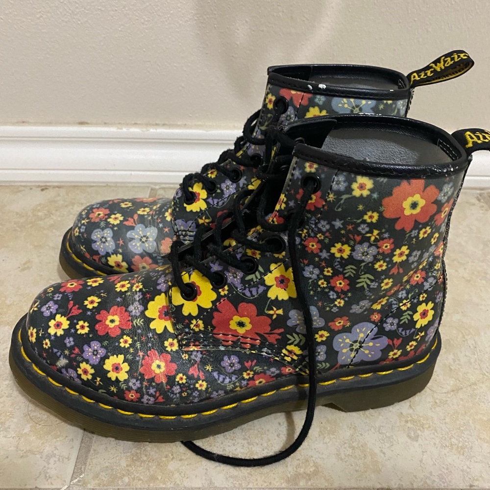 Dr. Martens vintage black multi colored floral combat boots.